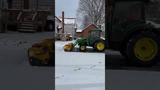 John Deere 4066r with cotech ext-rev 6-10 pusher doing some snow removal!