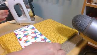 Pressing pleated masks