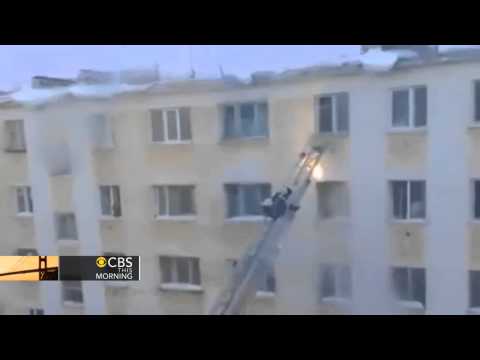 Falling snow sends firefighter tumbling down ladder