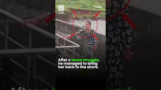 Young Man Saves Woman from River | Brave Rescue Caught on Camera