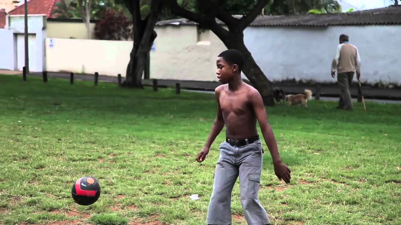 OneWorld Team getting soundly beaten in a game of football with some local South African Kids