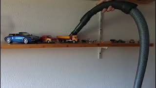Vacuuming dust from the shelf Net Worth