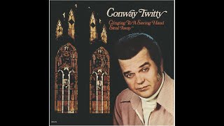 Video thumbnail of "Conway Twitty - Clinging To A Saving Hand"