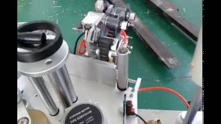 SC-103A High speed round botte sticker labeling machine.mp4