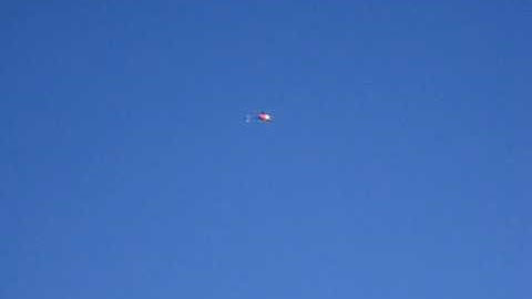 Trex 450S sport flying inverted hovering, rolls, loops and flying backwards roll