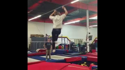 Girl short hair slackline flip fails