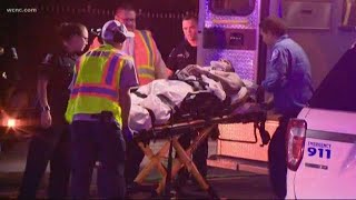 CMPD officers hurt in crash near scene of city's 90th homicide