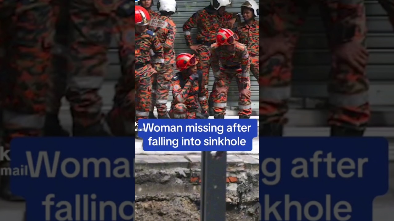 CCTV footage shows a tourist plunging into a sinkhole in Malaysia. 