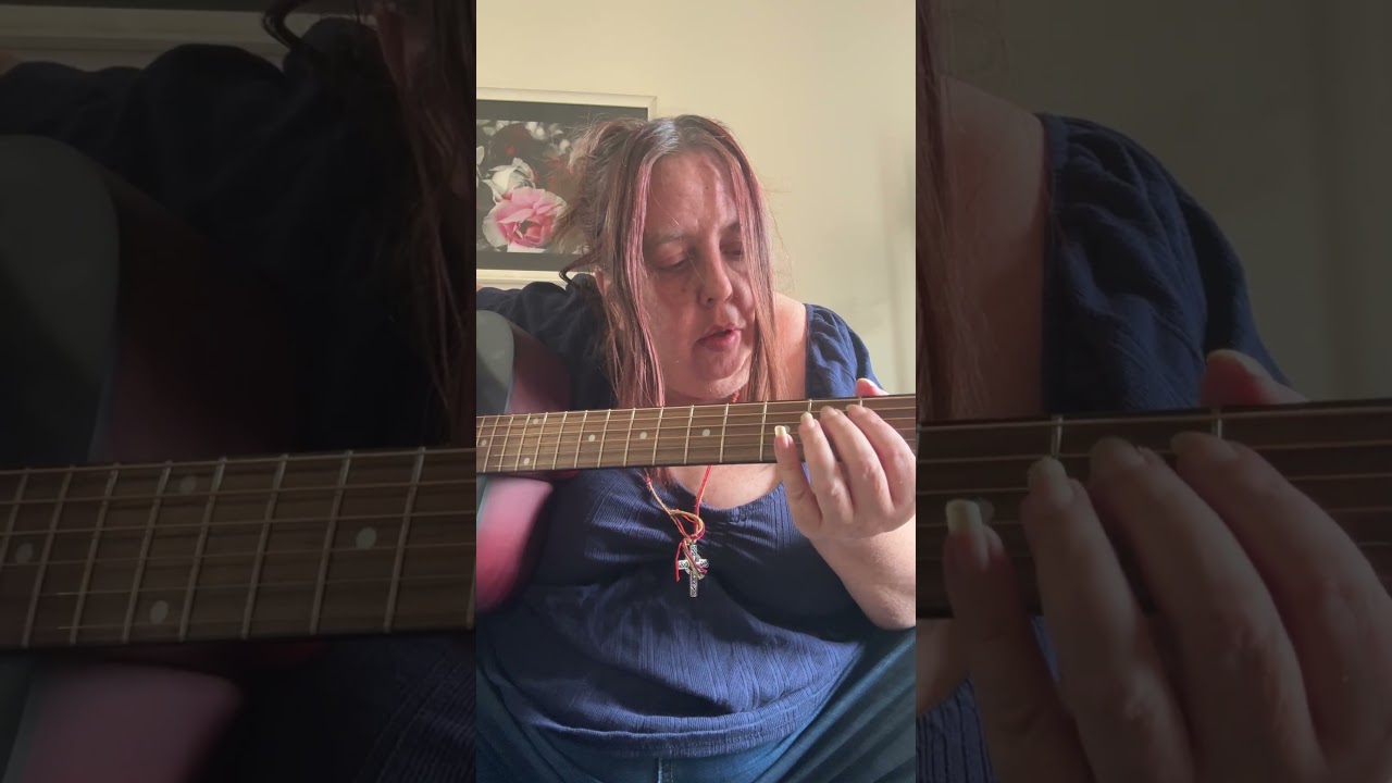 Day two of playing guitar.  I have tuned it and learned the chord em.  A little.