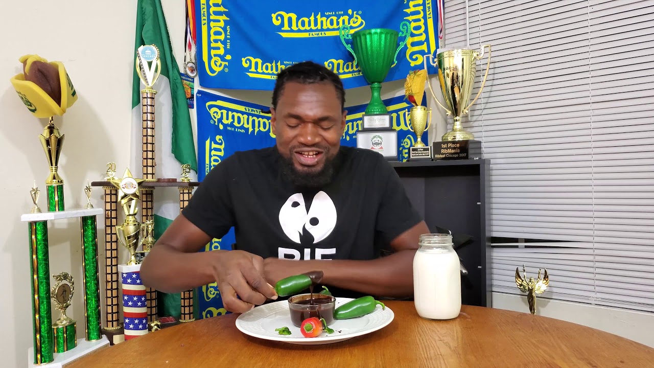 Gideon Oji Eats Multiple Raw Jalapeños covered in Hershey’s Fudge