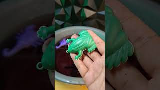green frog animal toy