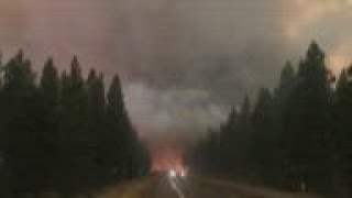 Huge Calif. fire moves quickly across two counties
