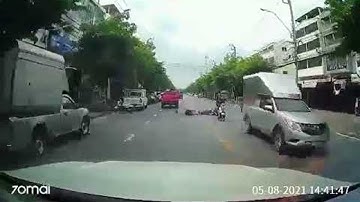 Quick Thinking Driver Dodges Falling Motorcyclist || ViralHog
