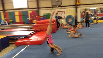 Handstand Forward Roll (with a stepout)