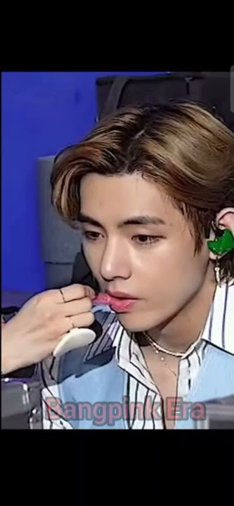 BTS makeup artist putting lipstick on BTS V's lips and he just 😂😂😂  watch till end......