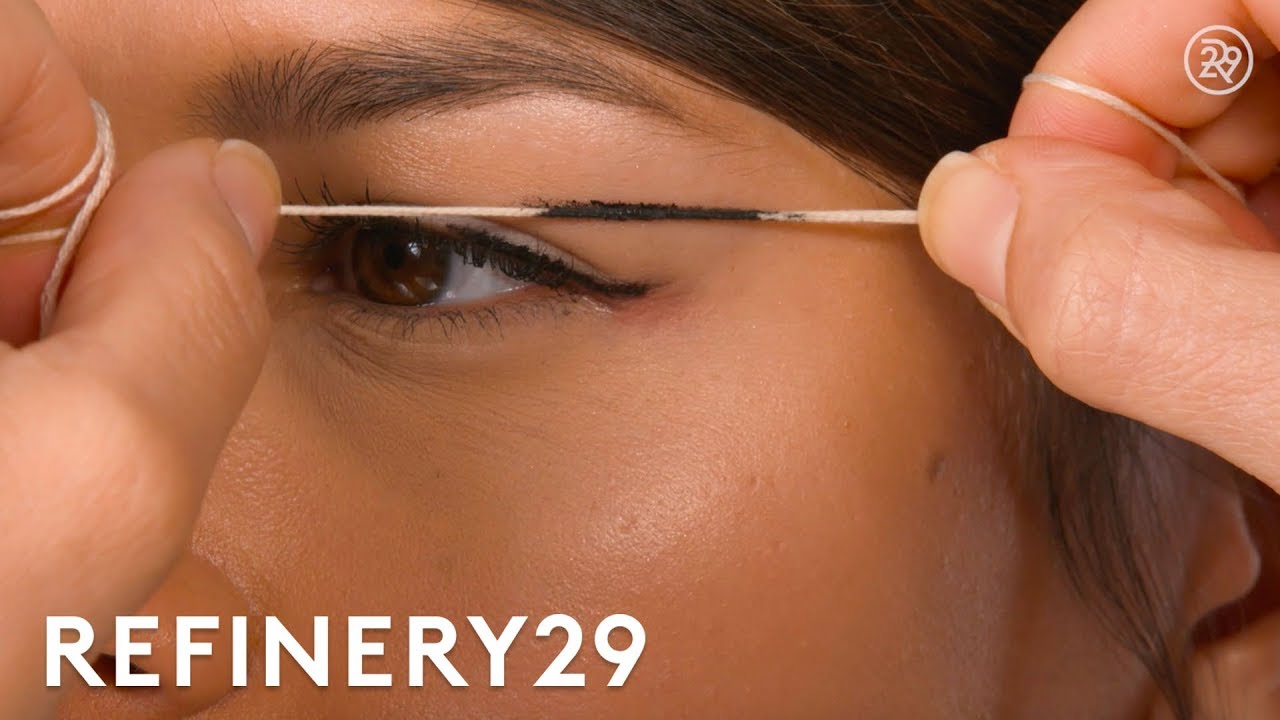 String Method Graphic Eyeliner Tutorial | Short Cuts | Refinery29 - We tried out this graphic look using an unconventional eyeliner method. 