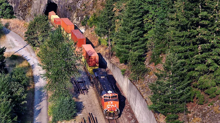 Huge Size Trains Rumbling Thru Tunnels Beside River In The Fraser Canyon!