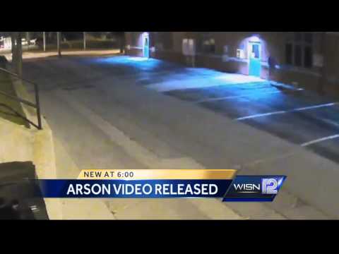 Surveillance video shows man starting fire in Port Washington dumpster