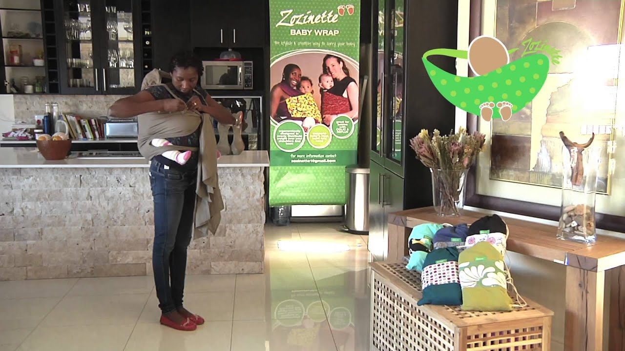 How to carry a baby on your back and hip using the Baboola - YouTube