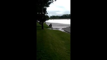 School bus drives into flood