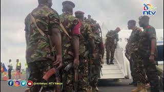 KDF soldiers board a plane at Goma International Airport as they exit DRCongo