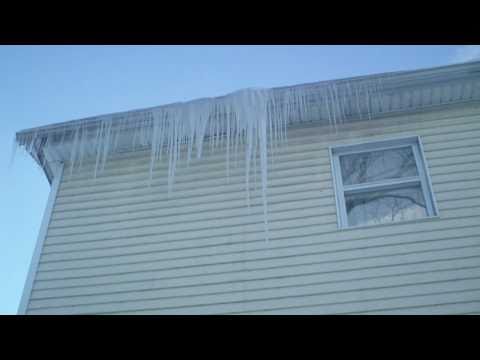 Man shoots Icicles From Gutter!
