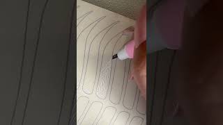 Microblading stroke patter on latex.