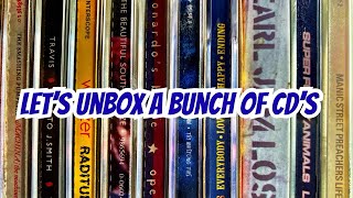 Unboxing a Discogs CD order.