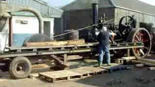 fowler traction engine driving a sawbench.