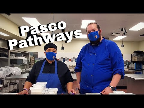 Welcome to the Academy of Culinary Arts at Land O Lakes High School!  We are excited to have you with us.  In this video we will give you a very brief tour of our facility and we also make a delicious holiday dessert that you can make at home!If you have any questions about the program, please reach out to Chef Jessica Cooper or Chef Jeremy Blythe any time!Jblythe@pasco.k12.fl.us or jgomes@pasco.k12.fl.usHere's the recipe we made today:Holiday Eggnog BreadIngredientsFor the bread:
1 ½ cups all-purpose flour
1 cup granulated sugar
½ teaspoon salt
1 teaspoon baking powder
½ teaspoon ground cinnamon
¼ teaspoon ground nutmeg
¾ cup  eggnog
½ cup  vegetable or canola oil
2 large eggs slightly beaten
1 teaspoon vanilla extract
½ teaspoon rum extract
For the eggnog glaze:
1 cup powdered sugar
3 tablespoons eggnog
½ teaspoon vanilla extract
¼ teaspoon rum extract
â…› teaspoon ground nutmegInstructions
Preheat oven to 350° F. Spray a 8 ½ x 4 ½ loaf pan with cooking spray and set aside.
In a large bowl, whisk together the flour, sugar, salt, baking powder, cinnamon, and nutmeg.
In a separate medium bowl, combine the eggnog, oil, eggs, vanilla extract, and rum extract.
Slowly add the wet ingredients to the dry ingredients. Stir until combined. Pour batter into prepared loaf pan. Pound on the counter so the loaf cake is evenly set in the pan.
Bake for 65-70 minutes, or until toothpick comes out clean. Place the loaf on a cooling rack and cool for 15 minutes. Loosen the sides of the bread with a knife. Carefully remove loaf from pan. Let cool completely on wire rack.
While the bread is cooling, make the eggnog glaze. In a small bowl, whisk together powdered sugar, eggnog, vanilla extract, rum extract, and nutmeg. Drizzle the glaze of the cooled loaf cake. Cut into slices and serve.
Note-if the cake isn't done and the top is browning too much, drape a piece of aluminum foil over the top and finish baking until a toothpic Pasco Pathways: Academy of Culinary Arts at Land O Lakes High School