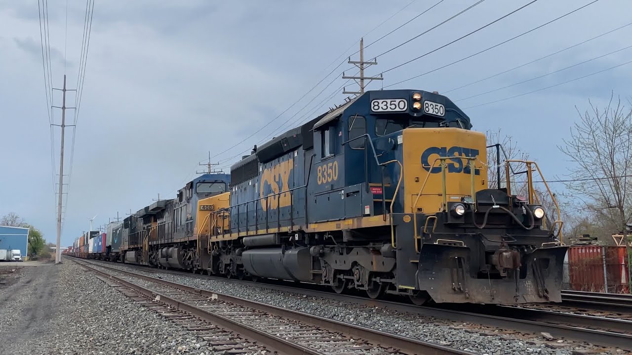 CSX SD40-2 8350 leading CSX I008-25 through Wickliffe, OH on 4/25/25