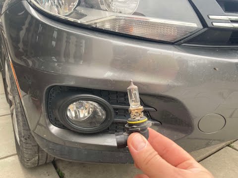 Замена лампы переднего противотуманного фонаря (ПТФ) VW Тигуан