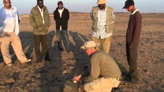Explaining the Geology of contact zones in Gold Prospecting with Arabic translation