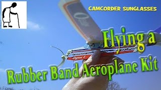 Flying a Rubber Band Aeroplane Kit CAMCORDER SUNGLASSES