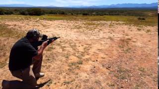 EJ Shooting a PMP Nkunzi PAW 20X42mm Rifle with a SAPHEI round at a car wreck at 450m