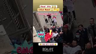 The child fell outside the building and was caught by everyone