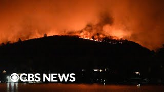 Crews working to contain wildfires on East and West Coasts