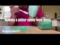 Making an epoxy glitter wine glass.