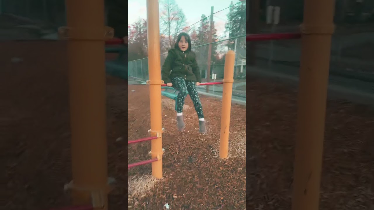 Aliya on the bars at the 