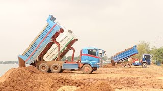 Amazing Dump truck fast unloading soils in action