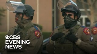 States race to secure capitols amid threats of armed protests