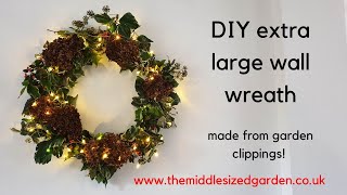 DIY large wreath made from hula hoop and garden clippings!
