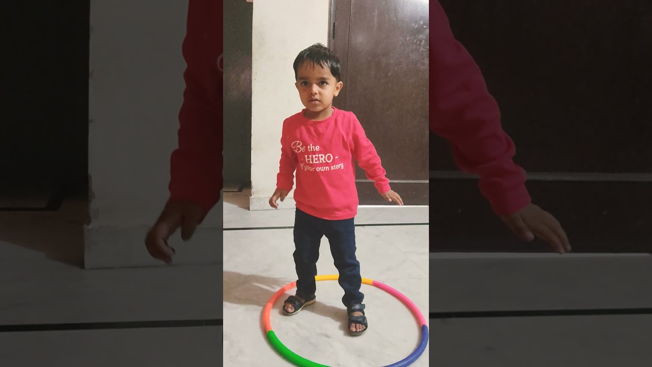 kiyansh playing with hoop ring 