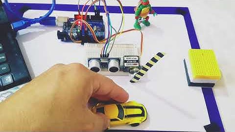 pluma de estacionamiento con sensor de proximidad en arduino