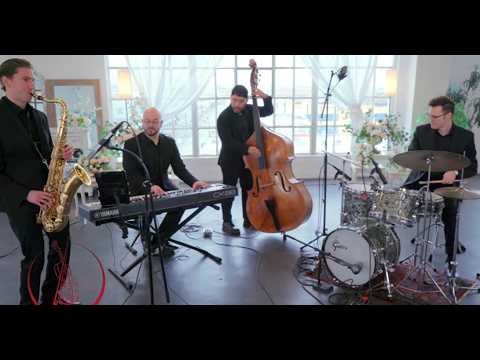 Resonance Band four-piece performing Groove Merchant