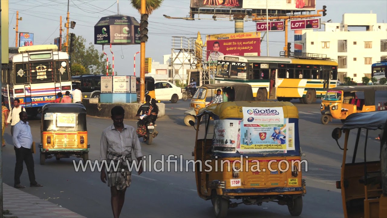 Traffic in Andhra Pradesh - a montahe of different vehicles and transport types