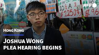 Police van arrives at Hong Kong court ahead of Joshua Wong plea hearing | AFP