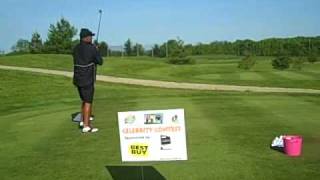 Cincinnati Bengals Coach Marvin Lewis tees it up for charity
