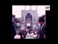 SYND 24 1 79 TEHRAN SHOWING PEOPLE IN BAZAARS 