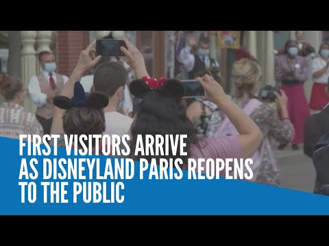 First visitors arrive as Disneyland Paris reopens to the public